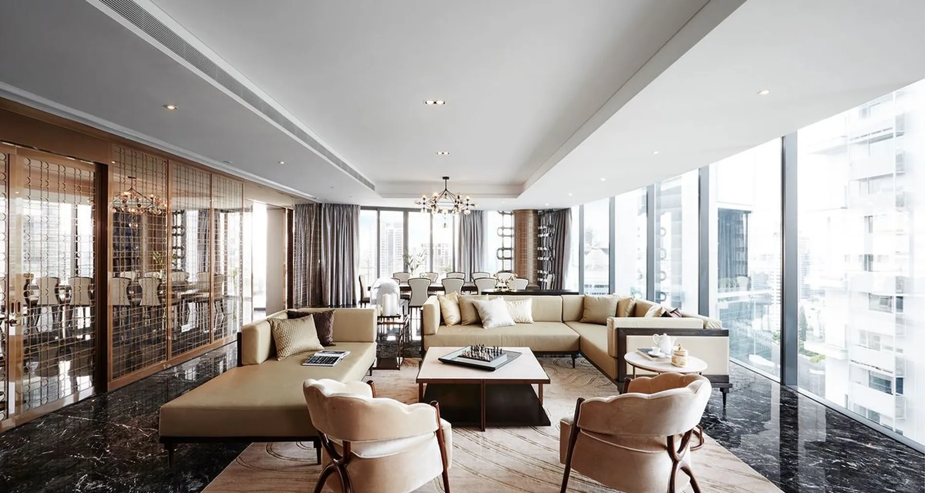 Living area of a private Singapore residence with floor-to-ceiling city views