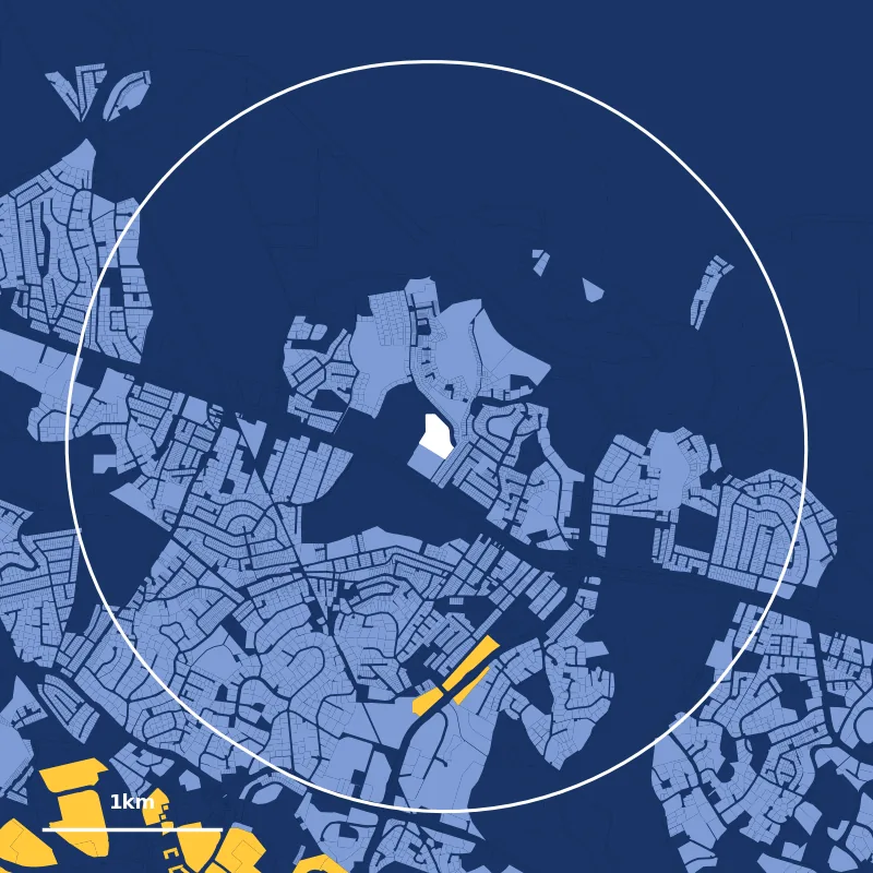 Map of homes within 2km of Raffles Girls’ Primary School: HDB plots in yellow, private plots in blue