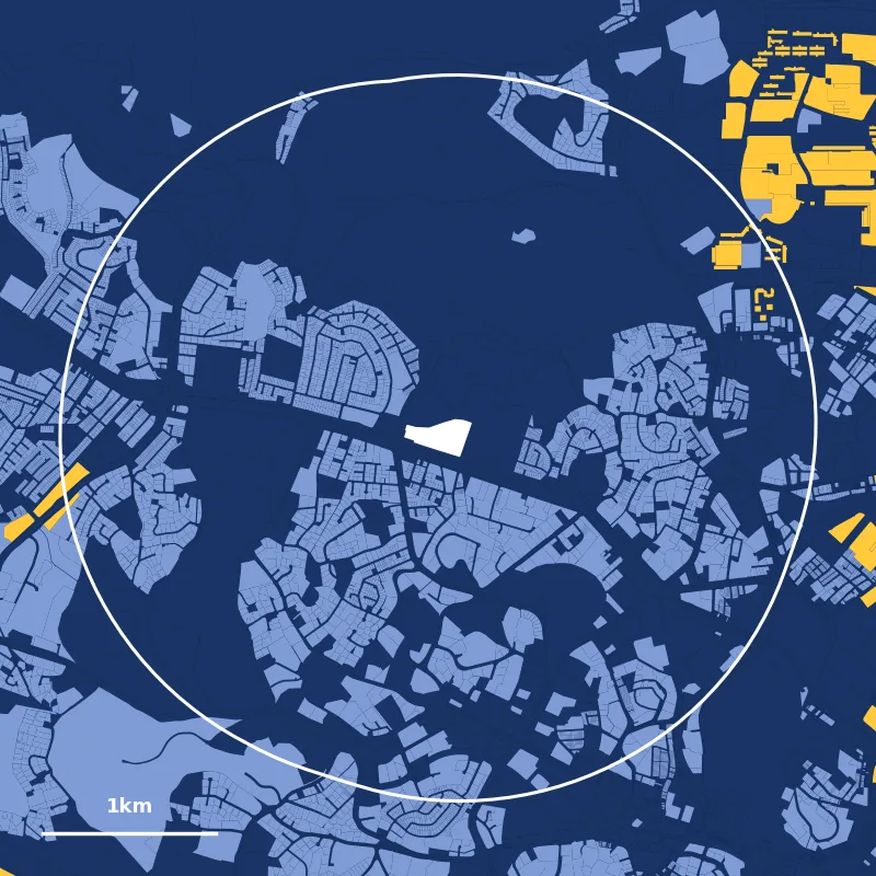 Map of homes within 2km of Singapore Chinese Girls’ Primary School: HDB plots in yellow, private plots in blue