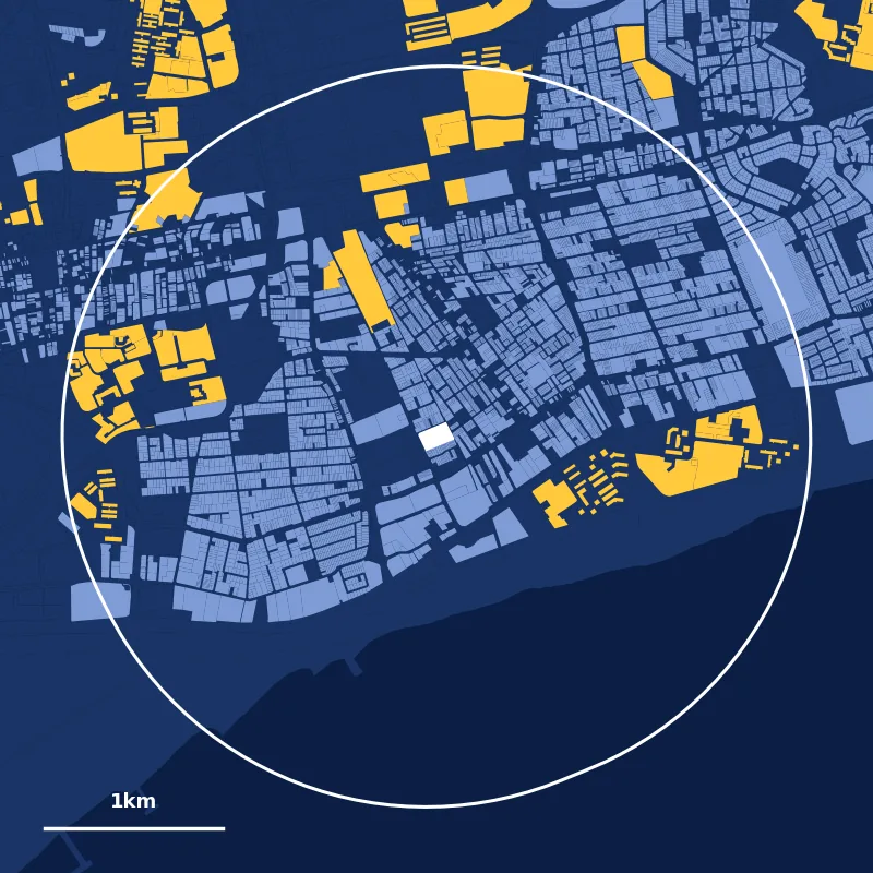 Map of homes within 2km of Tanjong Katong Primary School: HDB plots in yellow, private plots in blue
