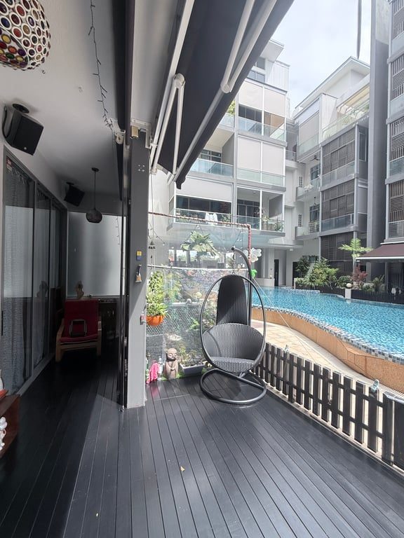Singapore private condominium exterior with swimming pool — illustrating the rental investment potential of both new launch and resale condos in Singapore's 2026 property market
