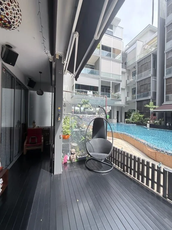 Singapore private condominium exterior with swimming pool — illustrating the rental investment potential of both new launch and resale condos in Singapore's 2026 property market