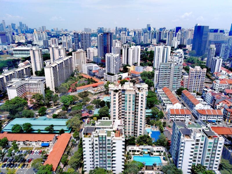 Aerial view of a mature Singapore residential estate showing a mix of private condominiums, HDB blocks and established neighbourhood amenities — typical of resale condo locations in 2026